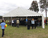 tent meeting: group of people meeting in a tent