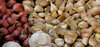 garlic and shallots: fresh garlic and shallots on sale at market