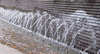 fountain streams: inner city rest area with row of fountains aimed at wall