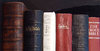 Bible collection: row variety of old and current Bible