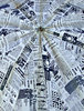 old news umbrella: unusual umbrella covered in newsprint-style material
