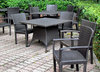 dark dining outdoors: black caneware outdoors dining setting