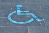 paved disability parking: disability parking symbol on special paved parking area