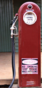 old bowser: old - antique petrol bowser - fuel pump