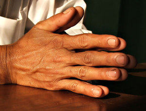 hands1: man's folded hands - as in prayer