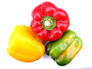 capsicum colours: green, red and yellow capsicums - bell peppers