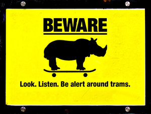 don't be a rhino: sign warning against unnecessary risks with trams