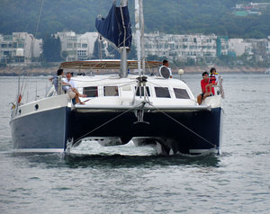 heading out2: catamaran pleasure craft on recreational outing in Hong Kong waters