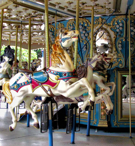 at the carousel2: a carnival's children's horse carousel - merry-go-round