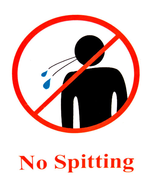 no spitting: sign warning against spitting