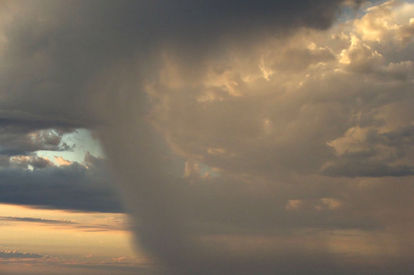storm clouds: rain bearing storm clouds over ocean
