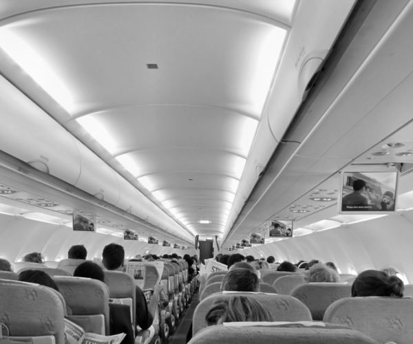 in flight1: passengers on international flight ready for take-off