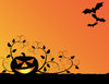 Grinning Jack: Grinning pumpkin lantern silhouetted against an orange gradient.  This one had added spooky bat appeal.