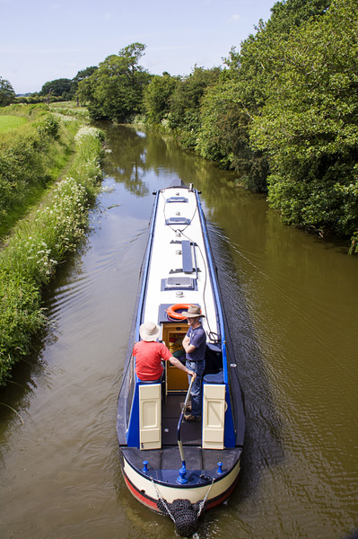 Narrow-boat Cruising: Cruising on a narrow-boat along the Lancaster canal at Barton.