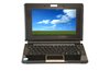 Laptop: Laptop with screen displaying blue sky field landscape (woodsy copyright image)