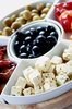 Feta Cheese: Cubes of feta cheese with olives