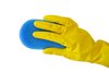 Scrub: Yellow gloved hand with a kitchen scrub