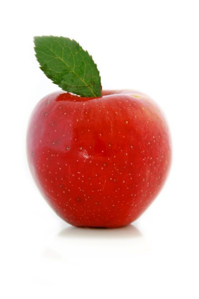 Red Apple: Red skinned apple with a green leaf against a white background