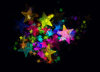 Lots of Stars 2: A black sky with rainbow coloured stars - just magic! A grat background, texture,fill, or element.