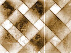 Grunge Tiles: Old grunge tiled background in sepia tones in a diagonal pattern.