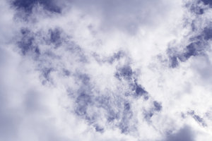 Cloudy Sky: Lots of whispy white clouds in a blue sky. Makes a great background or texture.
