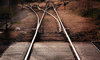 Railroad tracks: Railroad track that spins off into several branches - a good symbol for a choice among several possibilities, several ways