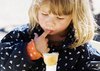 Ice cream: Little girl enjoying an icecream
