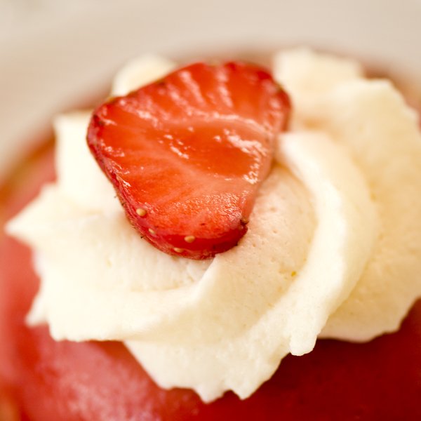 Strawberry in cream: macro of a strawberry short cake